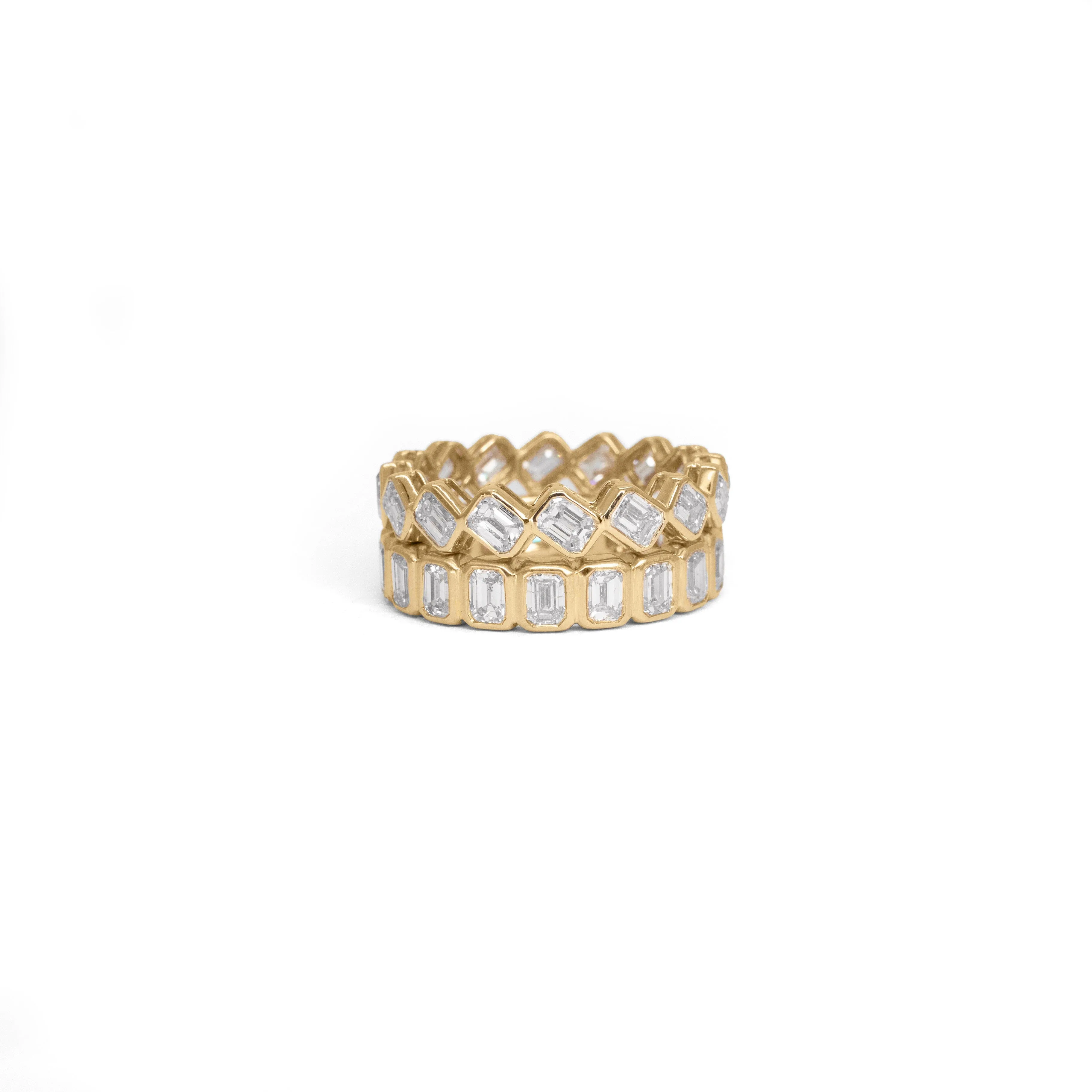 Emerald cut bezel set eternity band