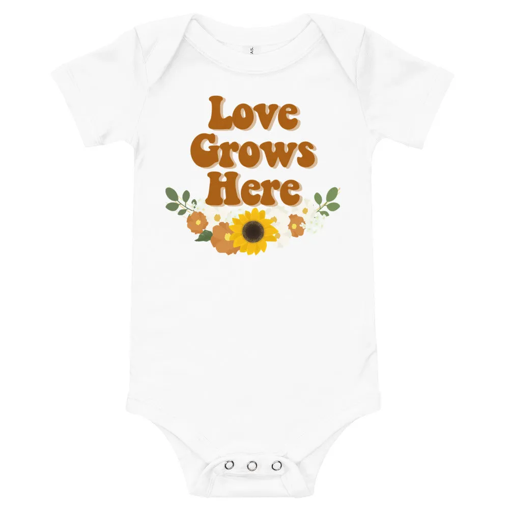 "Love Grows Here" onesie